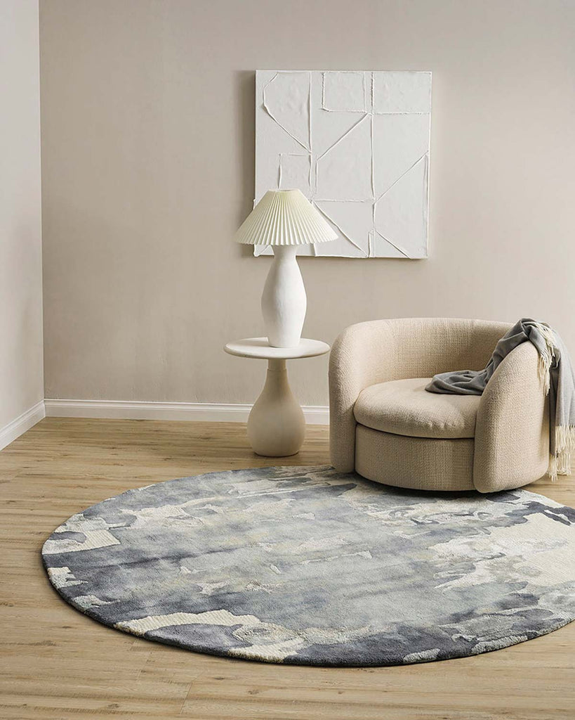 Baya NZ Cape Brett round rug situated in a stylish modern living room. 