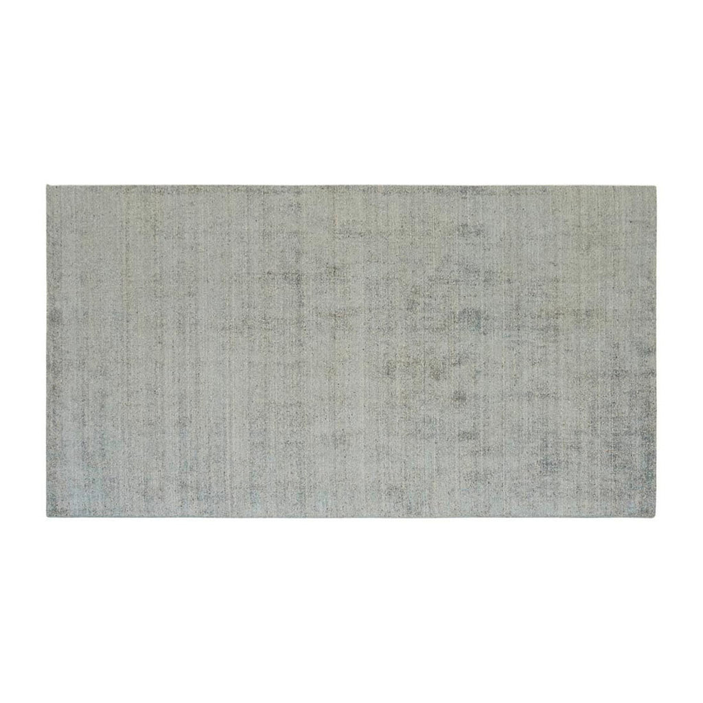 Full, top-down view of a viscose blend statement rug in shades of muted ocean blue, by Globe West and Soren Liv NZ.