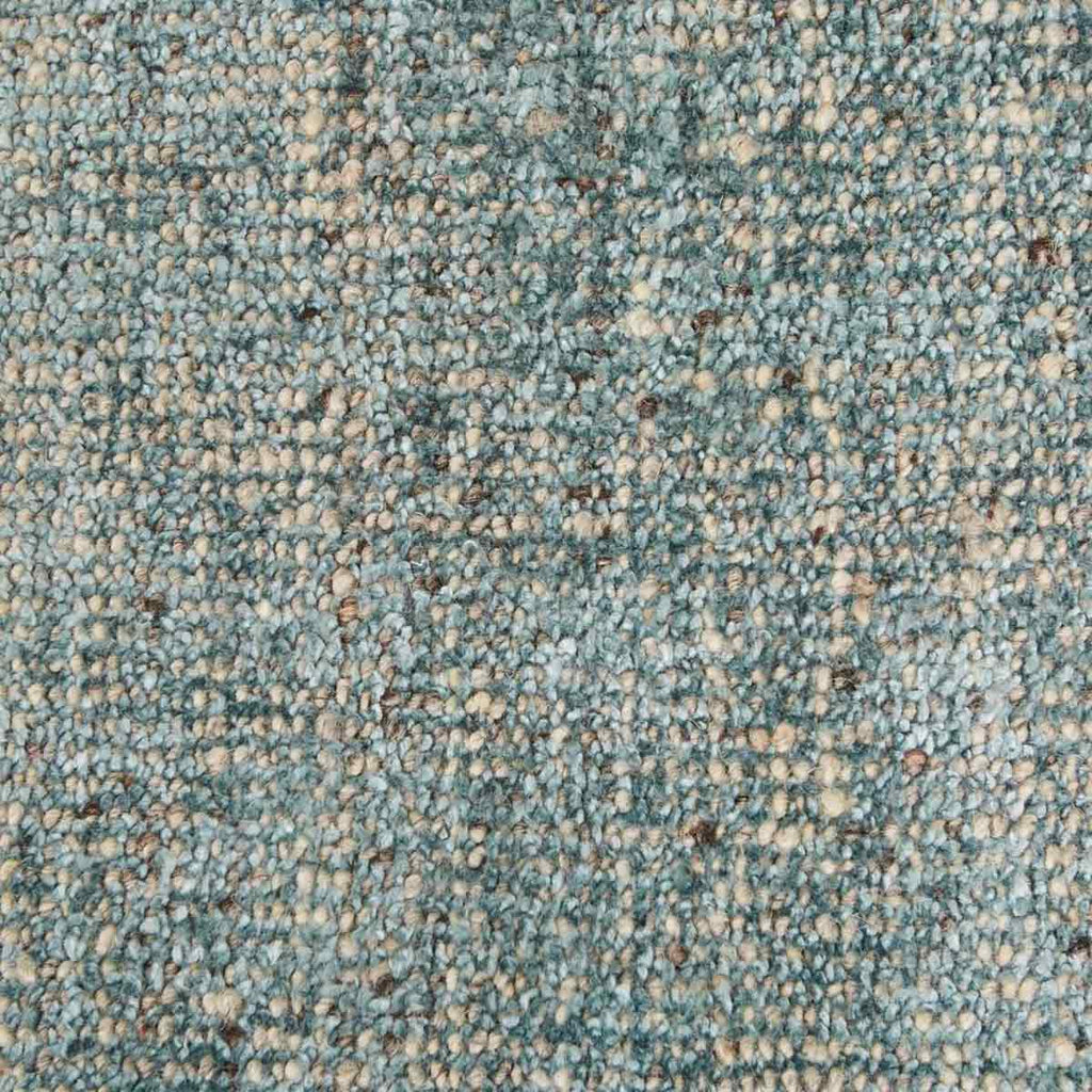 Close up of the weave of a viscose blend statement rug in shades of muted ocean blue, by Globe West and Soren Liv NZ.