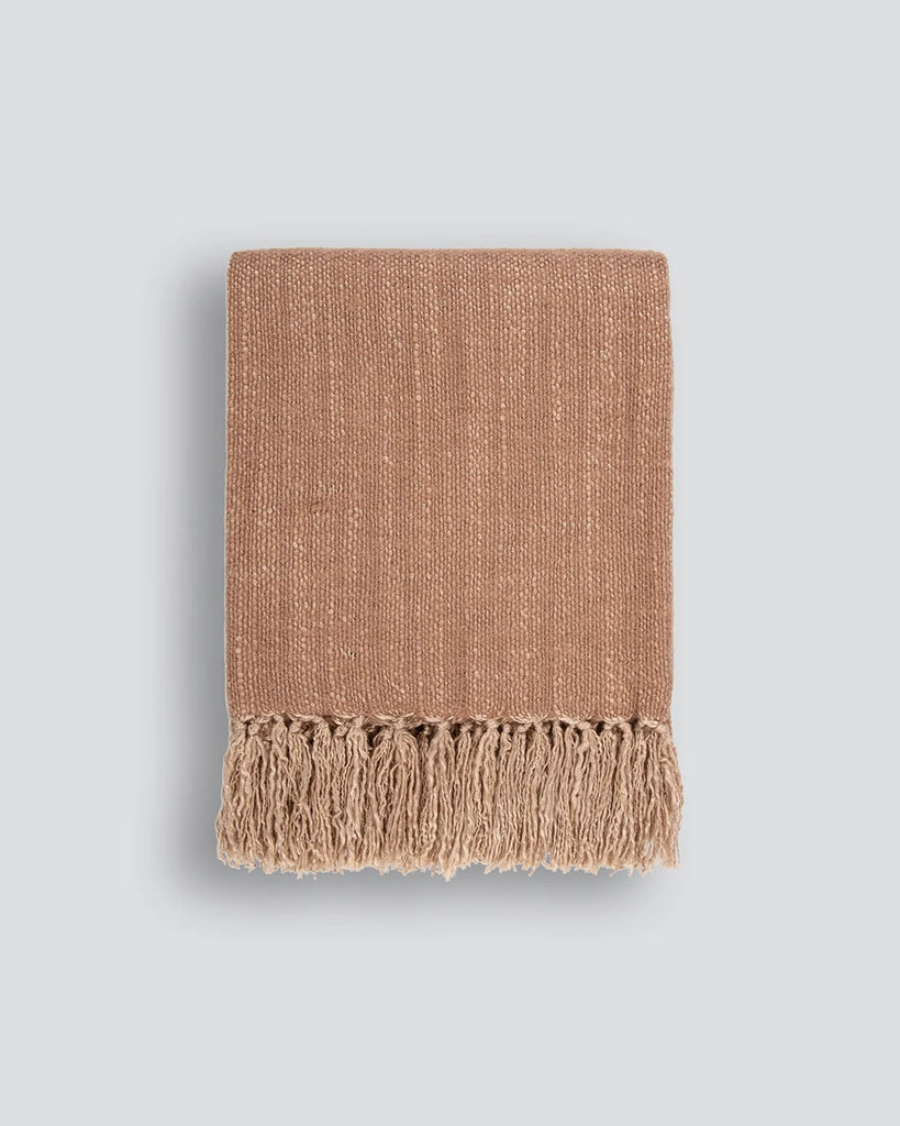 A brown-pink wool-blend throw blanket with tasseled fringe, by Baya nz