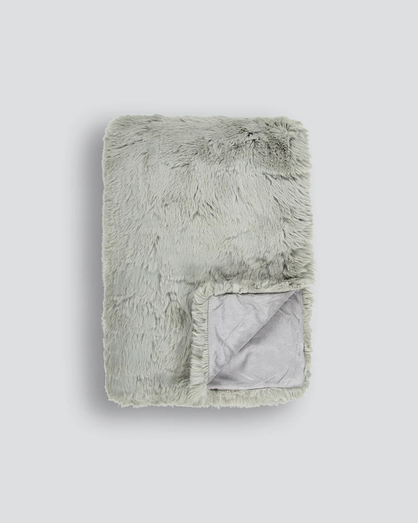 Pale green faux fur throw blanket by Baya nz