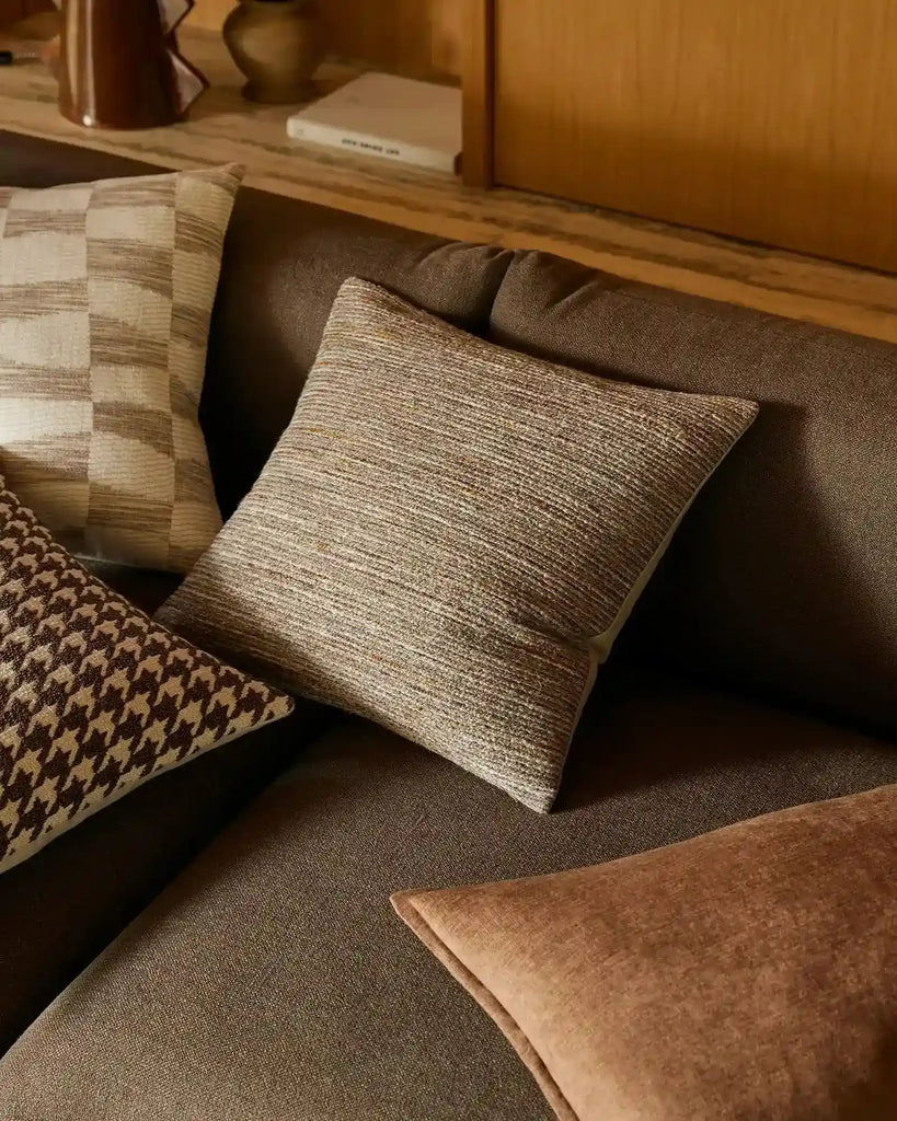 Stylish brown-=toned cushions in a variety of textures and patterns, by Weave Home nz