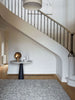 Tribe Home nz Bosco floor rug seen in a stylish home foyer by a stair well